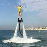 Notorious 90ft Luxury Yacht Dubai Back View with a beautiful Girl