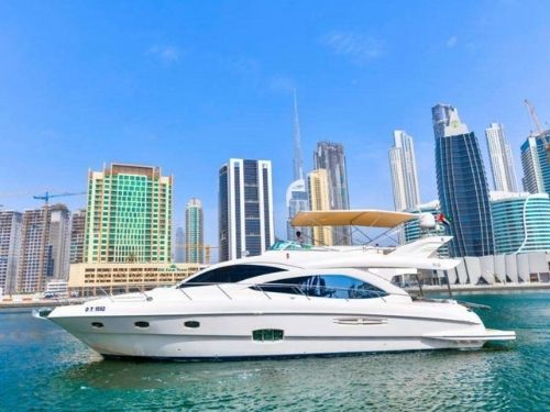 Notorious 90ft Luxury Yacht Dubai Back View with a beautiful Girl