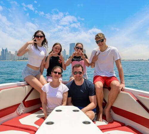 Laughing and flying together on a parasailing adventure in Dubai JBR