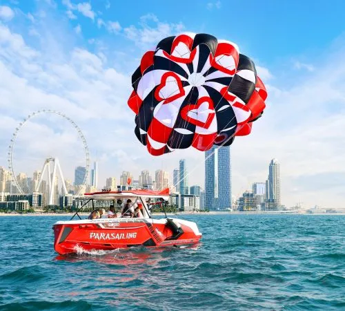 Red Parasailing Boat and Heart Parachute in Dubai